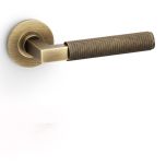 Alexander & Wilks AW200 Hurricane Knurled Lever on Round Rose Door Handle